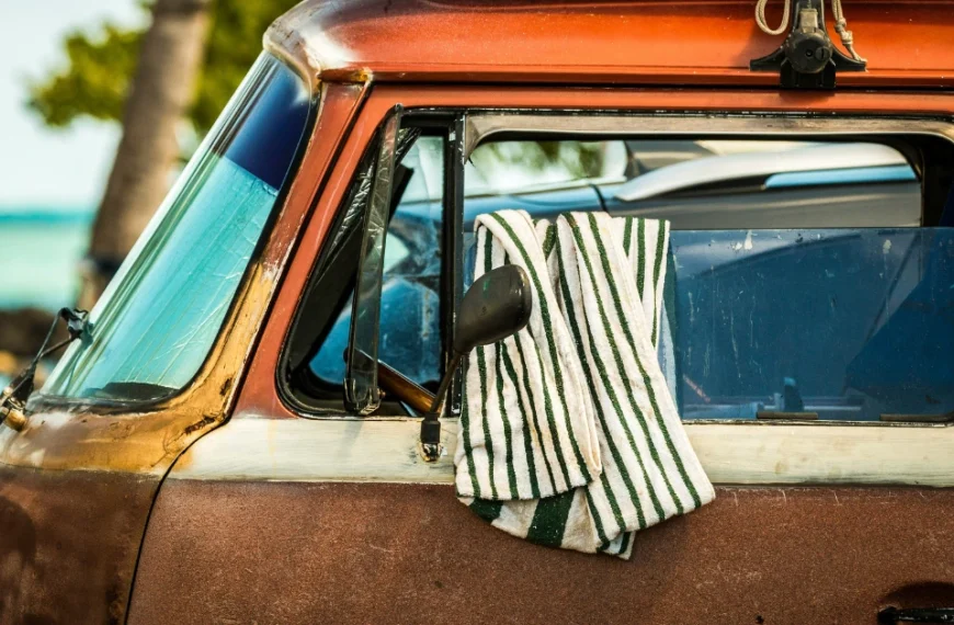 Towel hanging over the drivers window of a VW Bus