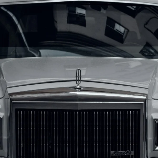 A white Lincoln MK2 photographed from the front