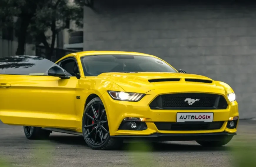 Yellow Ford Mustang Coupe with the Side Door open