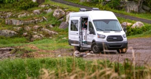 A white Ford Transit in the Nature