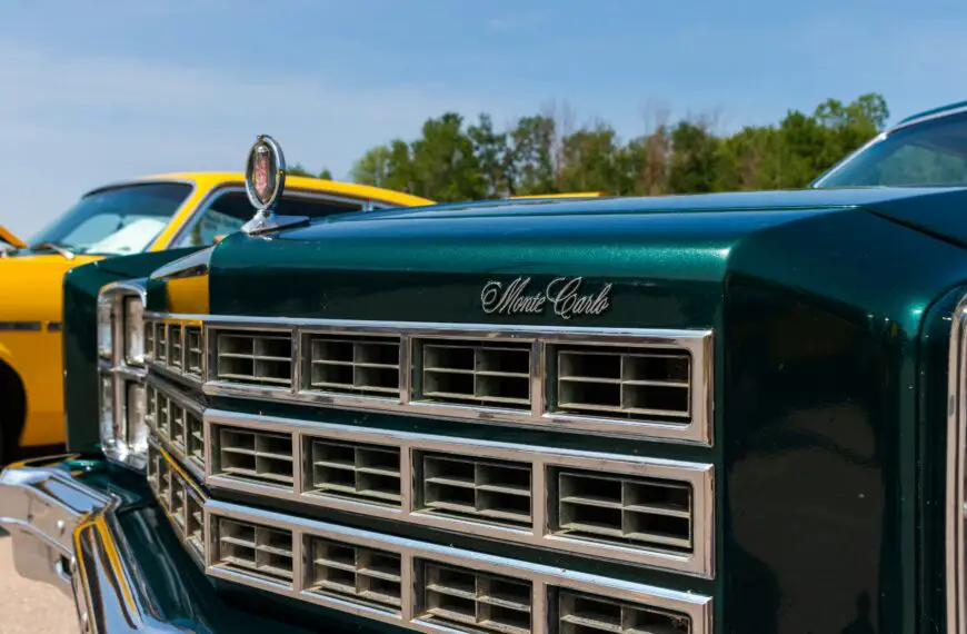 The front of a green, clear coated Cadillac