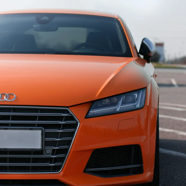 Light tinted Windows on a orange Audi TT