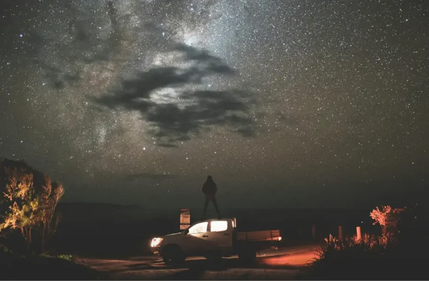 A SUV with a Tent in Front of a big Starsky