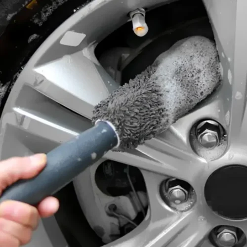 Rim gets cleaned with Microfiber Car Brush